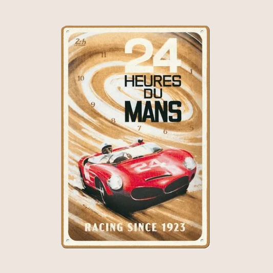 24 Heures du Mans "Racing Since 1923" Tin Sign - Rectangular retro metal plate (20 × 30 cm) with a red race car in the foreground and the text "24 Heures du Mans Racing Since 1923". Perfect for hanging in the garage or as a decorative vintage piece for motorsport enthusiasts.