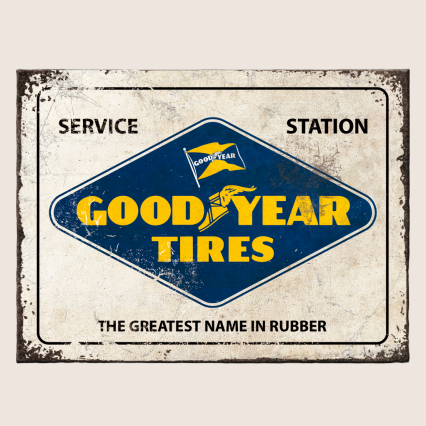 Goodyear Logo Magnet - Classic white magnet with the iconic Goodyear logo in blue and yellow. Perfect for the fridge or workshop for fans of automotive history and vintage design.