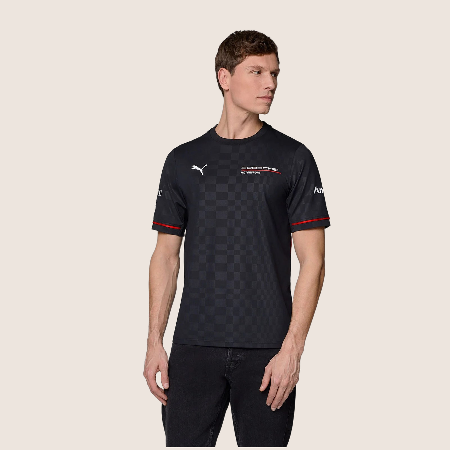 Black Porsche Motorsport Team T-shirt with short sleeves, red details and official Porsche and PUMA logos - designed for fans of motorsport and racing.