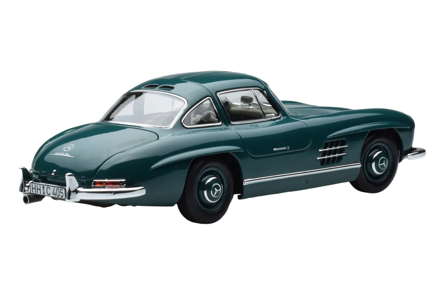 Detailed 1:18 scale model car of the classic 1954 Mercedes-Benz 300 SL. Manufactured by Norev with authentic design and iconic gullwing doors.
