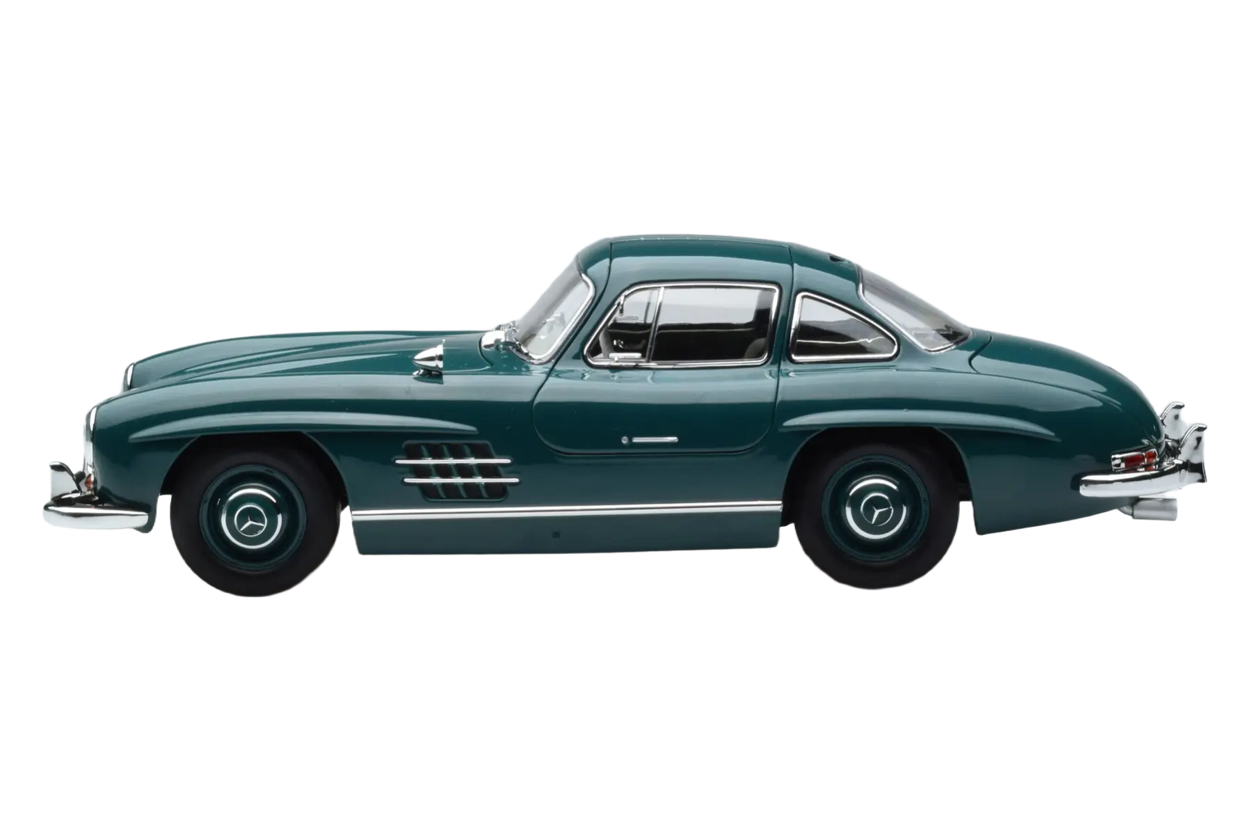 Detailed 1:18 scale model car of the classic 1954 Mercedes-Benz 300 SL. Manufactured by Norev with authentic design and iconic gullwing doors.