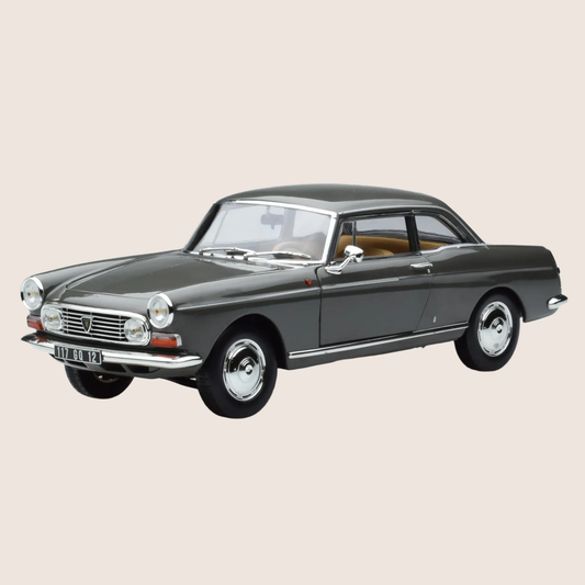 Peugeot 404 Coupe 1967 1:18 Norev - French elegance in the form of a 1:18 scale model of the Peugeot 404 Coupe from 1967.