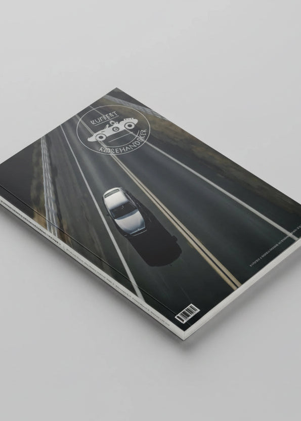 Suitcase & Driving Gloves Automotive Handbook 2024 - A comprehensive guide to car history, models and technical details.