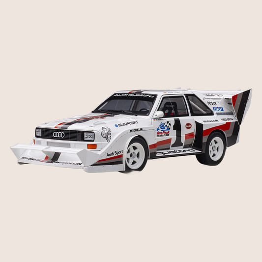 Audi Sport Quattro - Miniature model of the Audi Sport Quattro, a legendary rally car with a powerful engine.