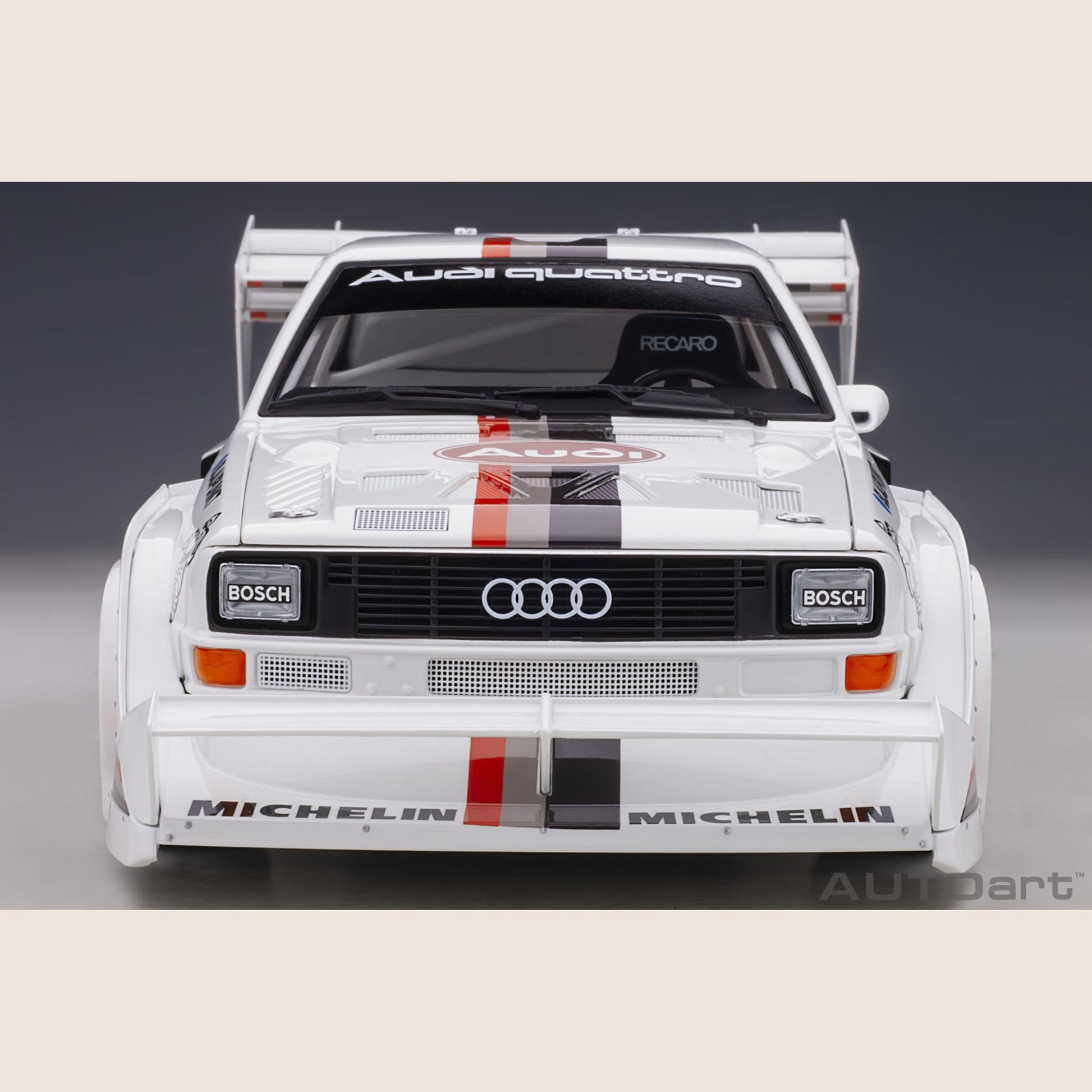 Audi Sport Quattro - Miniature model of the Audi Sport Quattro, a legendary rally car with a powerful engine.