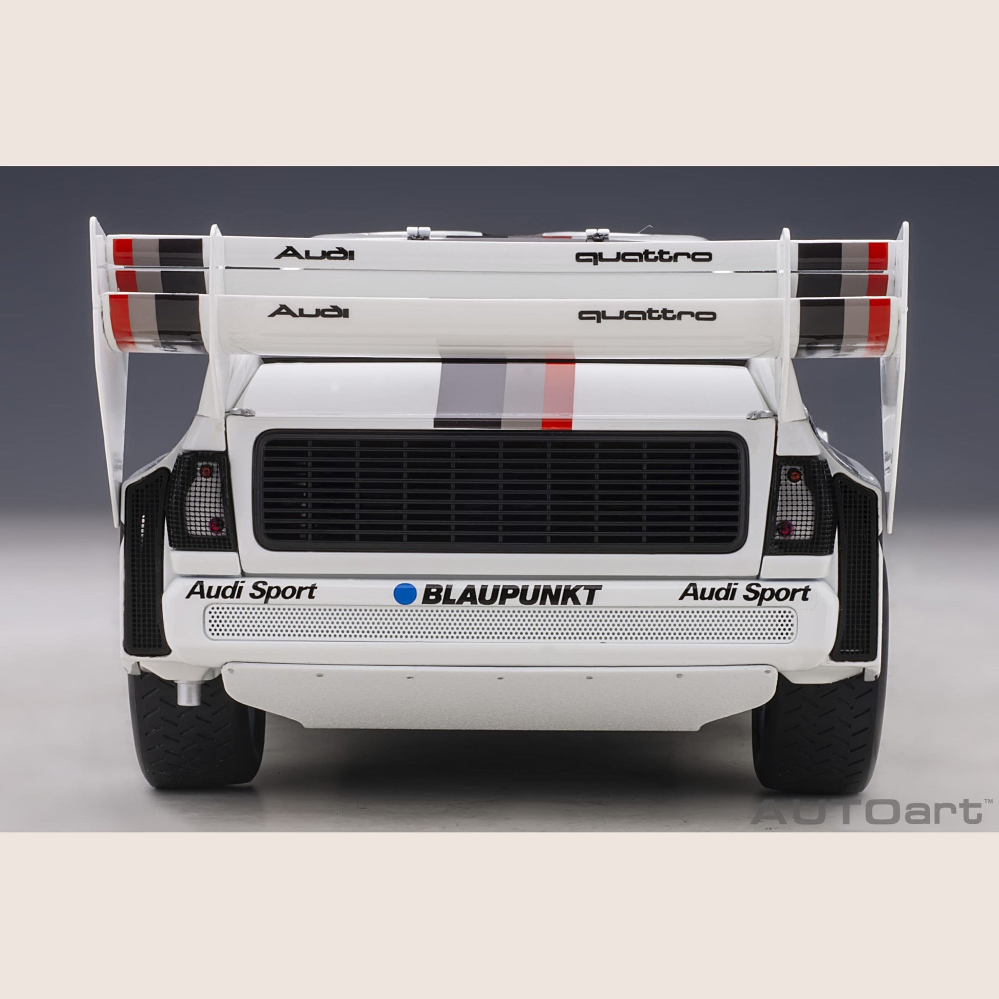 Audi Sport Quattro - Miniature model of the Audi Sport Quattro, a legendary rally car with a powerful engine.