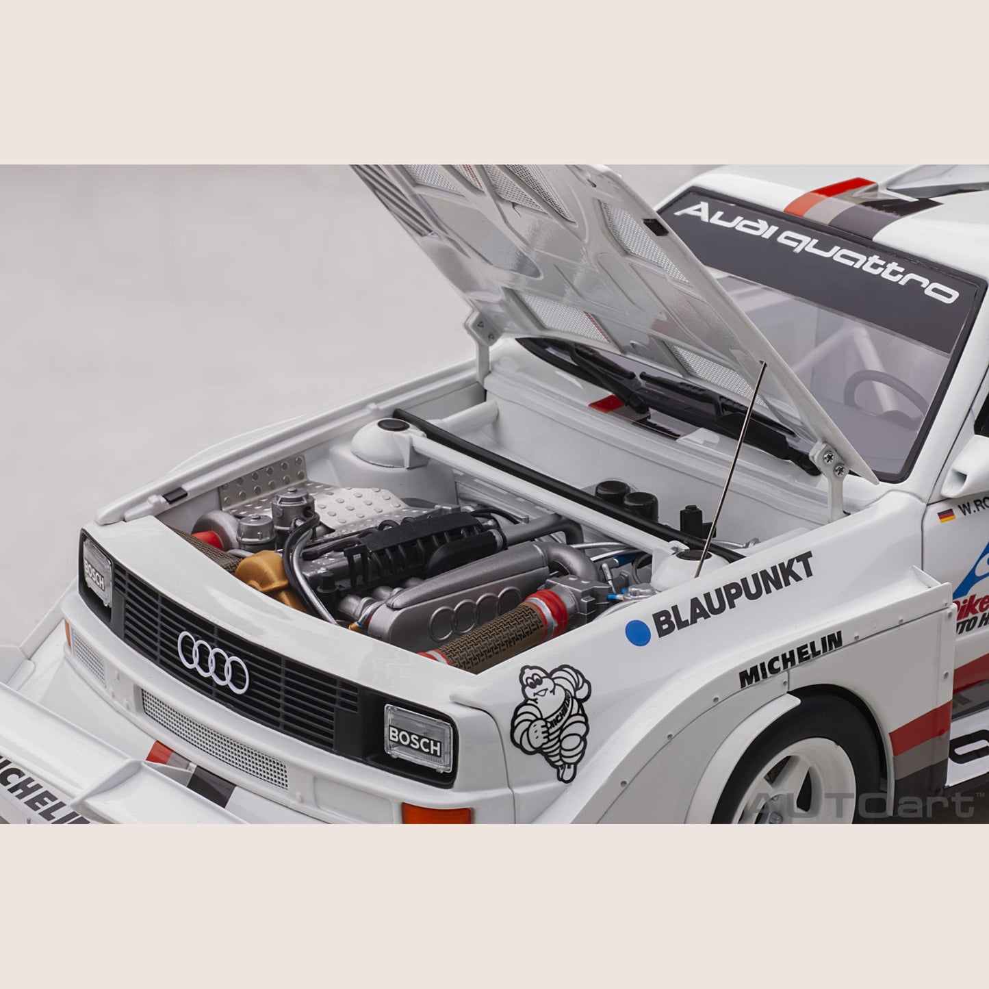 Audi Sport Quattro - Miniature model of the Audi Sport Quattro, a legendary rally car with a powerful engine.