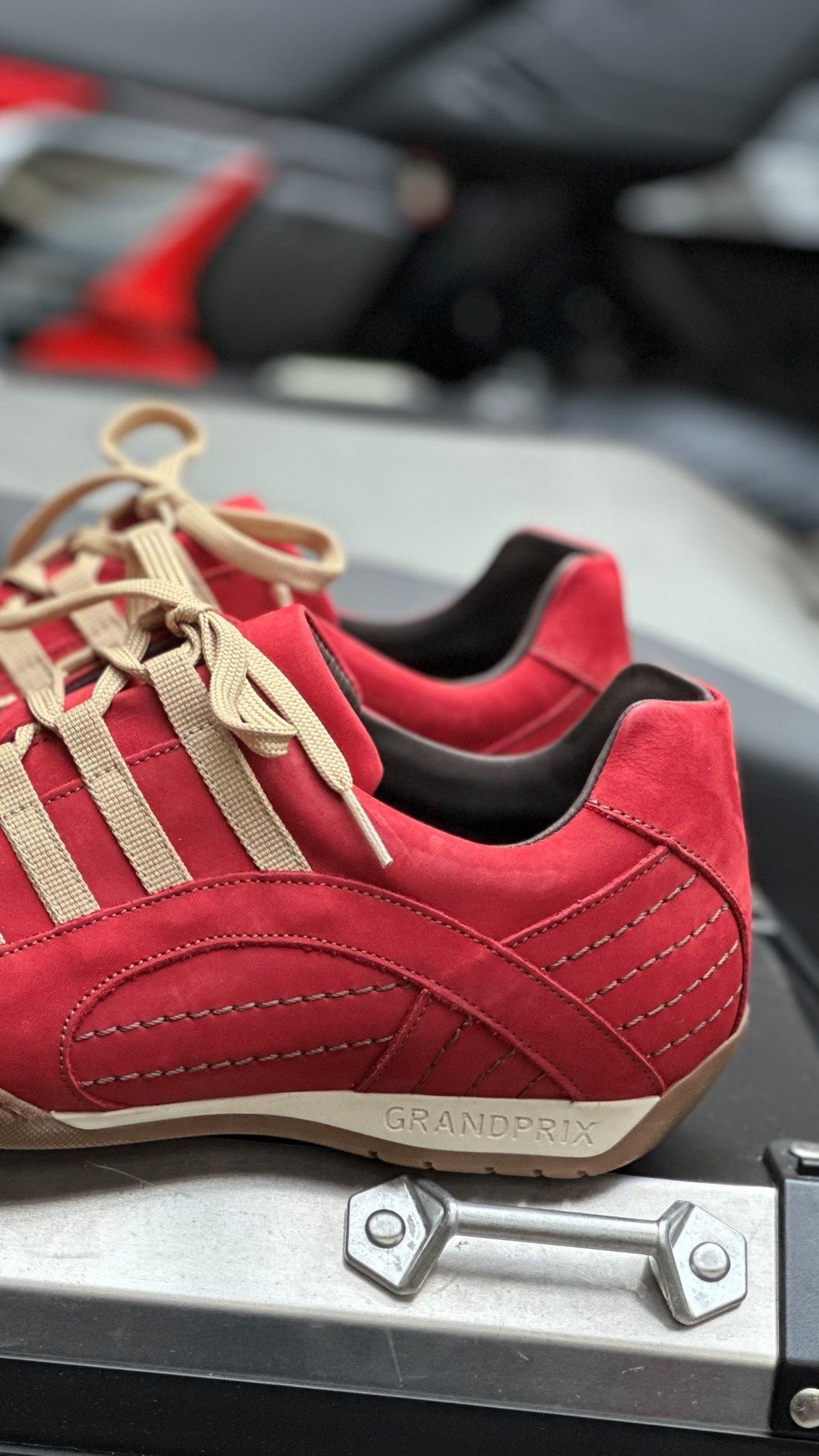Red Grandprix Originals Corsa Rosso sneakers in leather with tire-patterned sole and sporty design - inspired by classic motorsport.