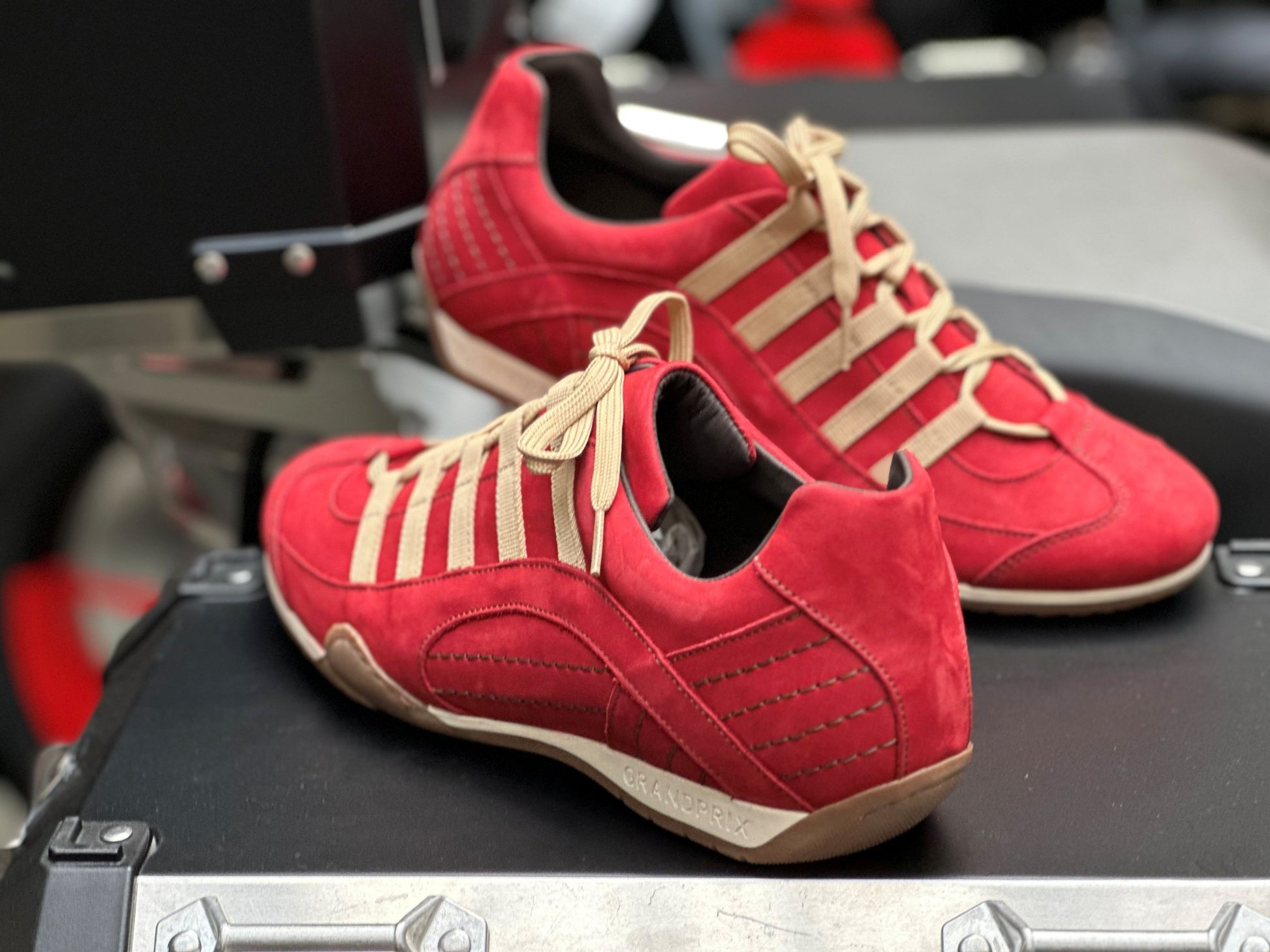 Red Grandprix Originals Corsa Rosso sneakers in leather with tire-patterned sole and sporty design - inspired by classic motorsport.