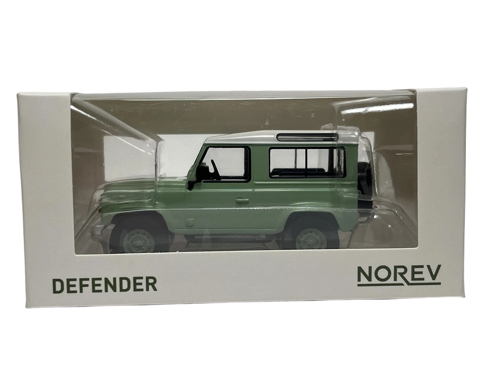 Land Rover Defender 1:43 - Accurately modeled 1:43 scale model of the rugged Land Rover Defender from Norev. Perfect for fans of off-road vehicles and collectors of classic 4x4 vehicles.