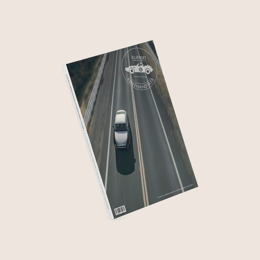 Suitcase & Driving Gloves Automotive Handbook 2024 - A comprehensive guide to car history, models and technical details.