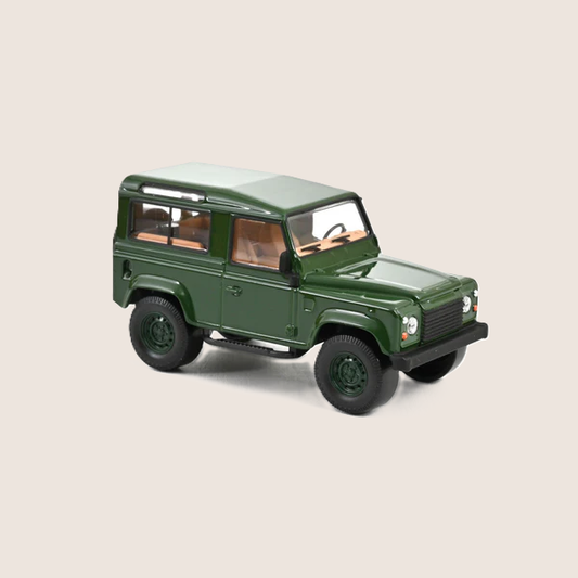 Land Rover Defender Dark Green 1:43 Norev - Detailed 1:43 scale model car with authentic dark green paint, classic design and realistic details.