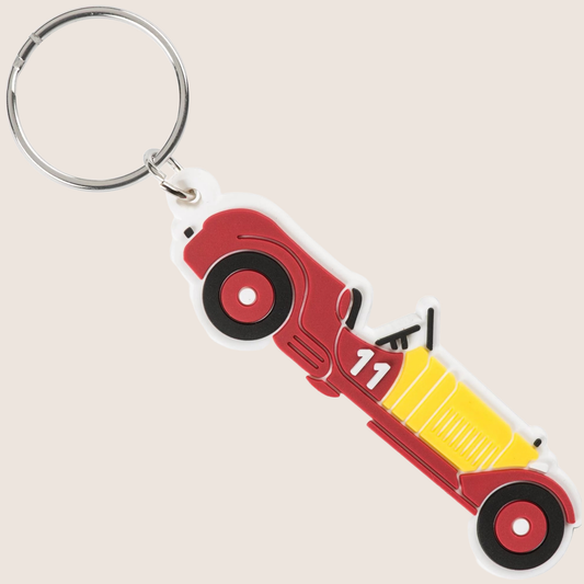 Silhouette Car Keychain - 24H Le Mans: Elegant metal keychain shaped like a car silhouette, inspired by the iconic 24-hour Le Mans race. Measuring 70 x 2 mm and available in multiple colors, this is a stylish and functional gift for motorsport fans.