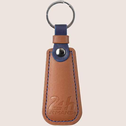 Leatherette Keyring - 24H Le Mans: Elegant leatherette keyring with 24H Le Mans logo. A stylish and durable accessory for car and racing enthusiasts.