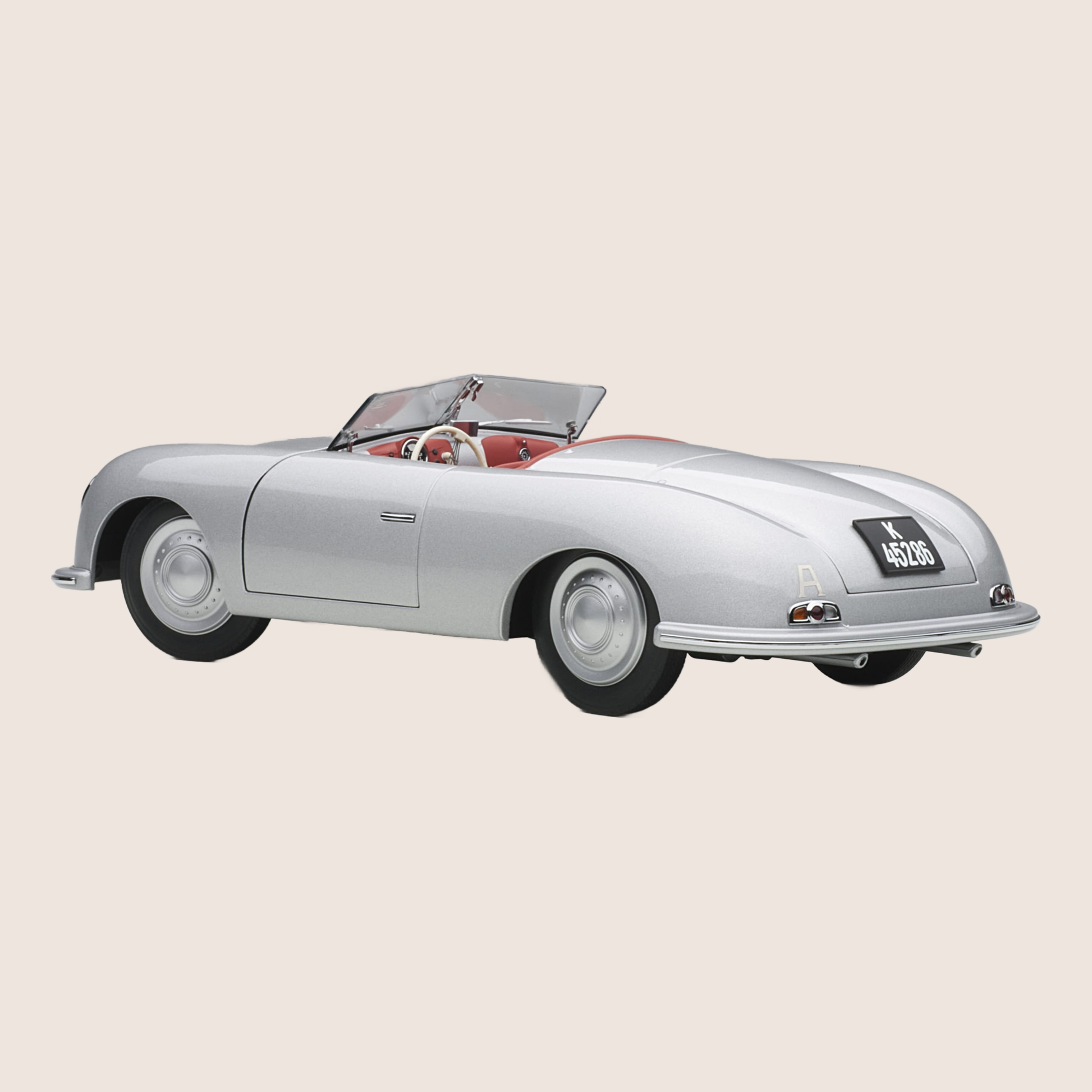 Porsche 356 model car in 1/18 scale from AutoArt - a precision-made replica of the iconic German sports car from 1948. This classic collector's model features a detailed interior, moving doors, hood and trunk, making it perfect for car enthusiasts and collectors of Porsche models.